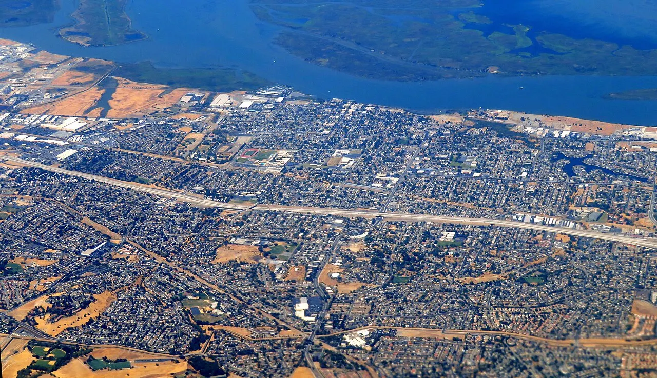 An aerial view of Antioch streets and neighborhoods beside the San Joaquin River and Delta islands.