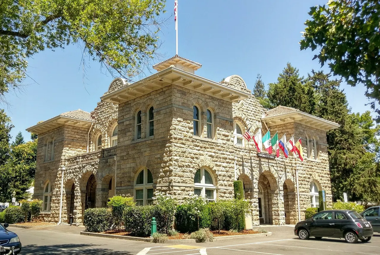 The stone facade of Sonoma City Hall beside Sonoma Plaza.